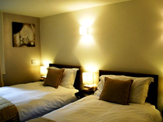 A twin room at Hotel Onesixtwo is perfect for two guests