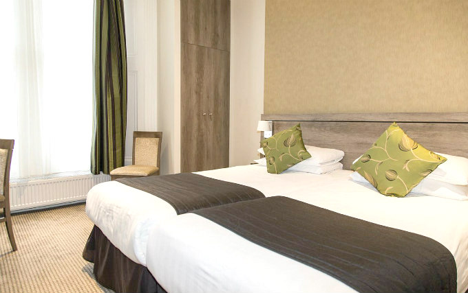 A twin room at Kensington Garden Hotel