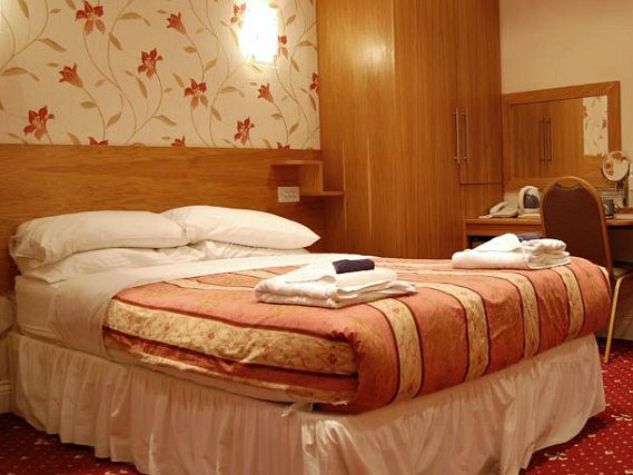 Get a good night's sleep in your comfortable room at Anchor House Hotel