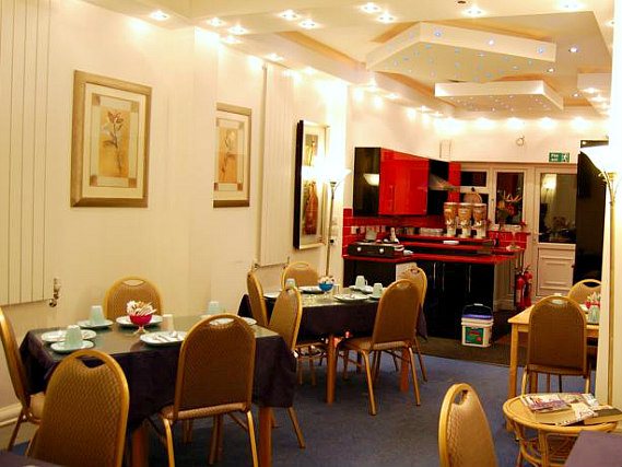 Enjoy your morning meal in the colourful and inviting breakfast room