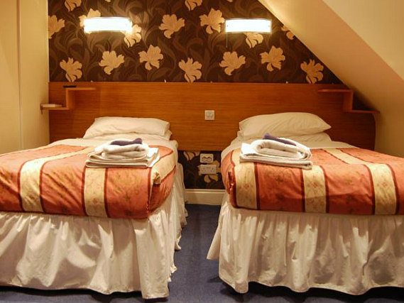 A twin room at Anchor House Hotel is perfect for two guests
