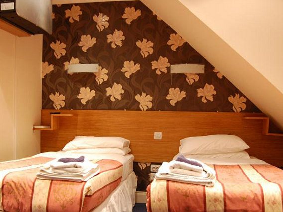 Enjoy a hot drink thanks to the tea/coffee making facilities in your room