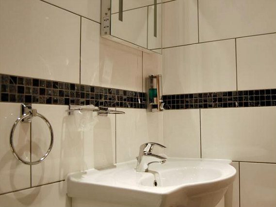 Relax in the private bathroom in your room