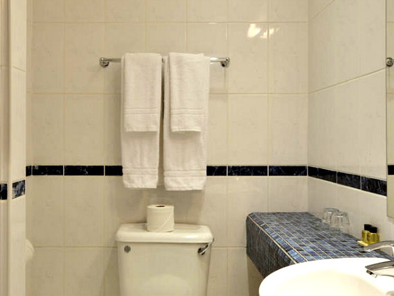 Relax in the private bathroom in your room at The Princes Square Hotel