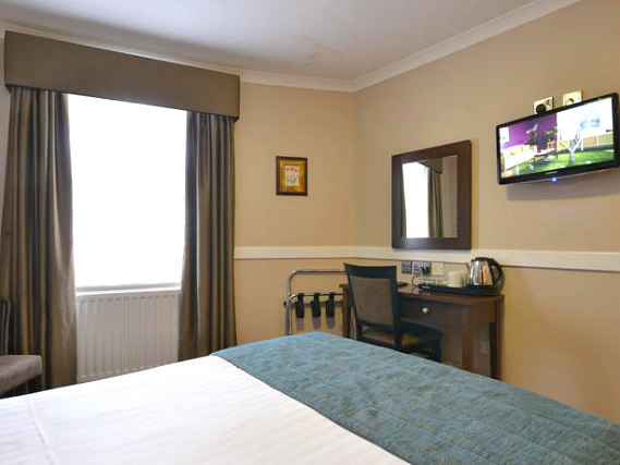 Put your feet up in front of the TV in your room