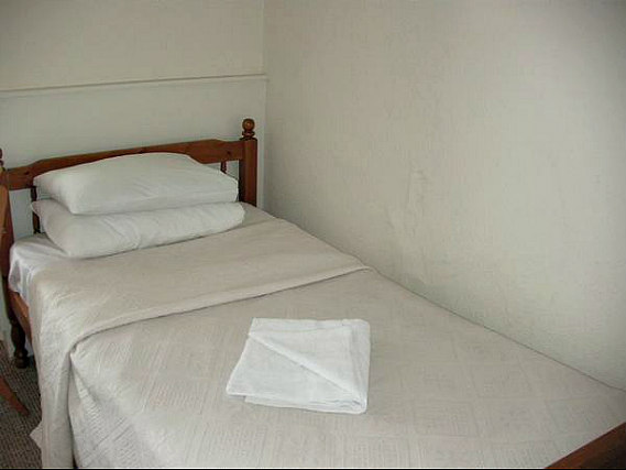 A single room at Five Kings Hotel