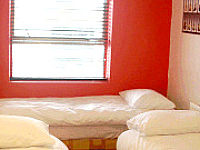 A basic and modern Triple bedroom at The Pay and Sleep