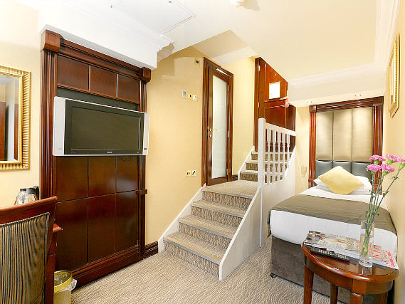 A single room at Shaftesbury Premier London Paddington Hotel
