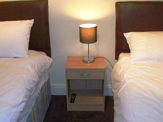 Une chambre avec lits jumeaux de City Lodge London