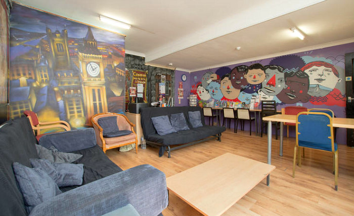 Make new friends and chill out in the TV lounge at the Central Hostel