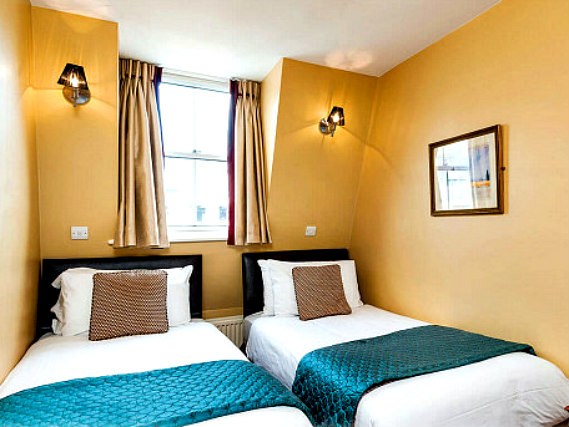 Une chambre avec lits jumeaux de Craven Hotel