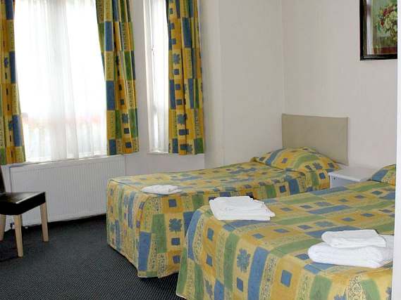 A typical triple room at Grantly Hotel London