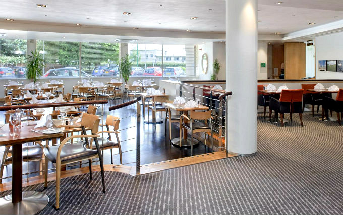 Relax and enjoy your meal in the Dining room at Holiday Inn Heathrow Ariel