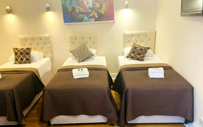 A typical triple room at The London Paddington Hotel