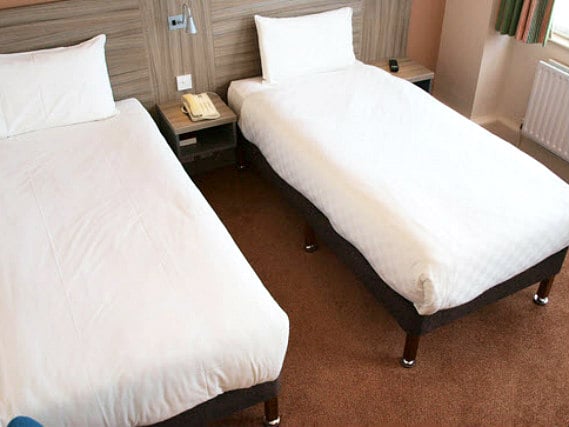 A twin room at Comfort Inn London is perfect for two guests