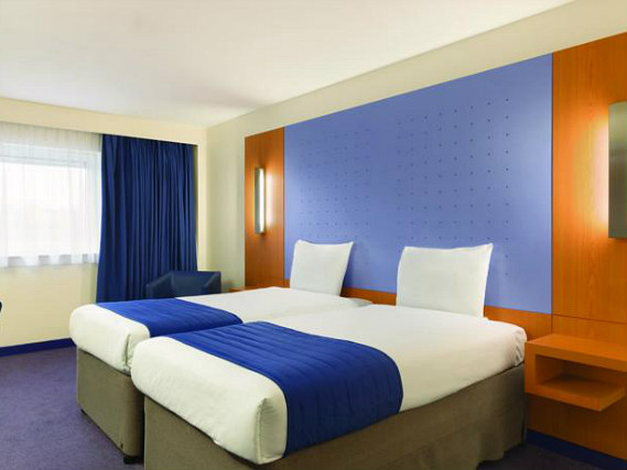 Une chambre avec lits jumeaux de Secret 3 Star Hotel North London