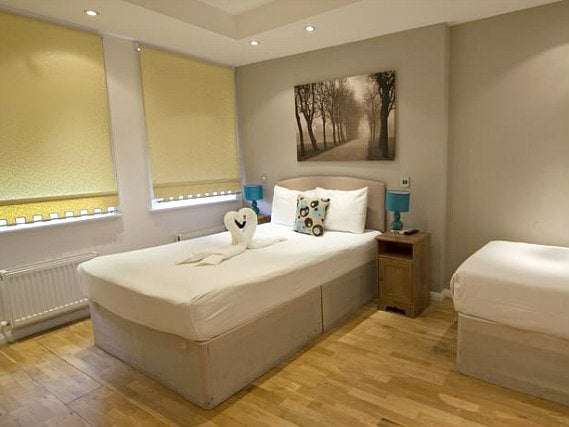Une chambre avec lits jumeaux de Hampstead Suites