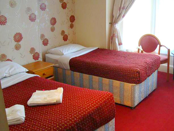 A typical triple room at Hotel Balkan