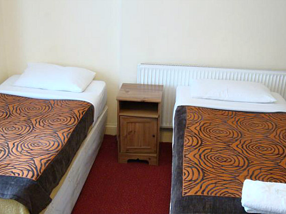 A twin room at Hotel Balkan is perfect for two guests