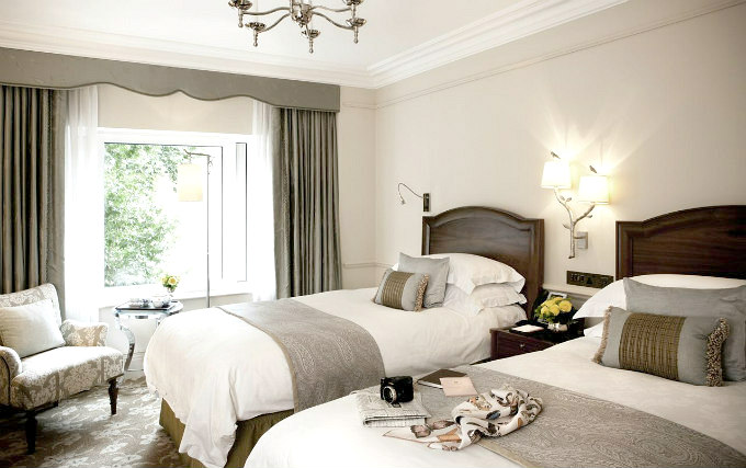 A twin room at Langham Hotel London
