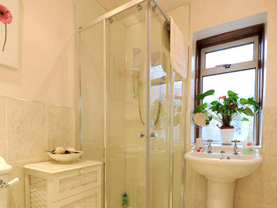 Relax in the private bathroom in your room