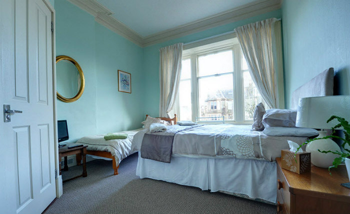 Put your feet up in front of the TV in your room