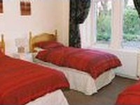 A triple room at the Dunard Guest House