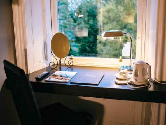 Enjoy a hot drink thanks to the tea/coffee making facilities in your room