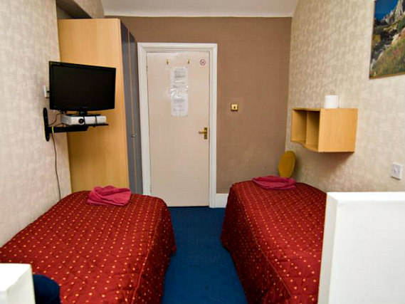 A twin room at Boston Court Hotel