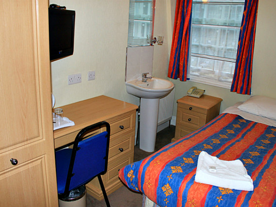 A typical single room at The Fairway Hotel London