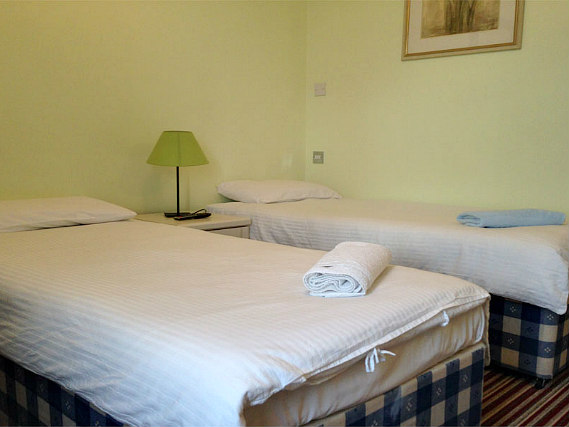 A twin room at Aron Guest House is perfect for two guests