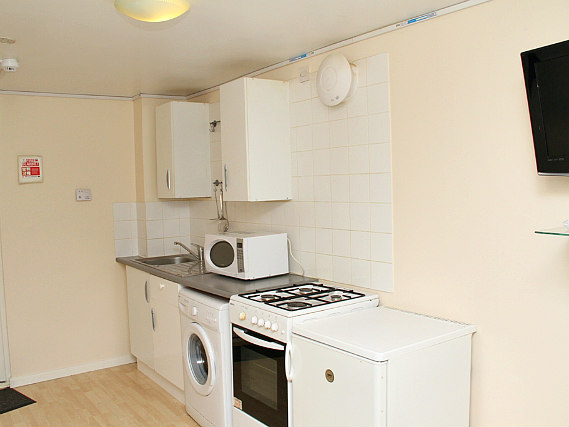 A clean and bright kitchen for you to prepare food