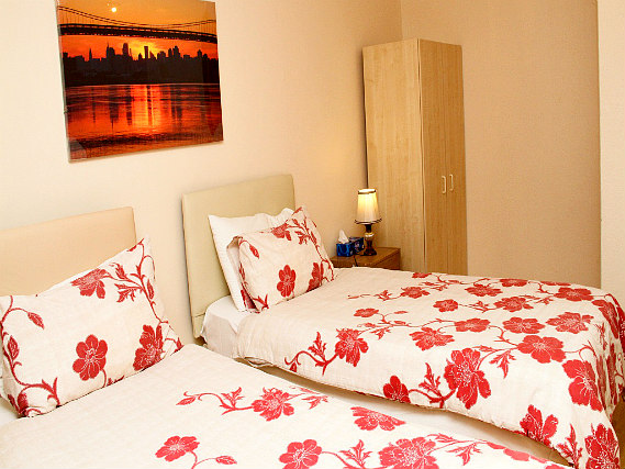 A spacious twin room at Julius Lodge Thamesmead