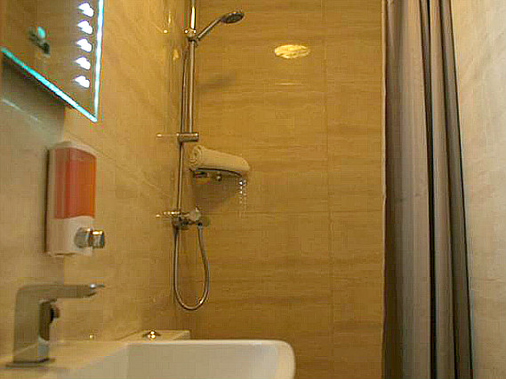A bathroom at BayTree Hotel