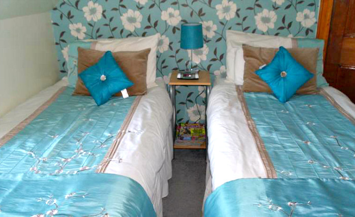 A twin room at ATuras-Mara Guest House is perfect for two guests