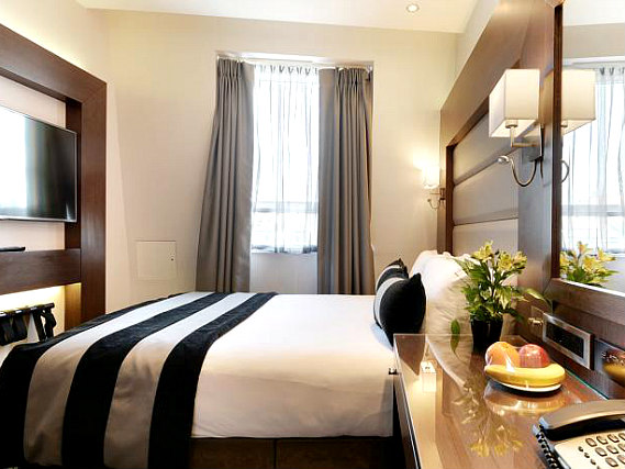 Get a good night's sleep in your comfortable room at Park Grand Paddington Court