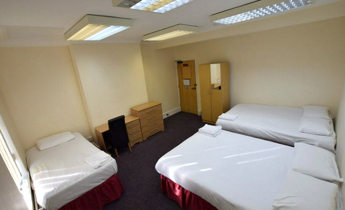 Rest easy in a comfortable bed in your room