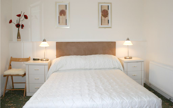 A comfortable double room at The Beachcomber Hotel