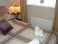 A double bedroom at BlueBelle Mansion B&B