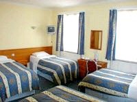 A Typical Quad Room at Astoria Hotel London