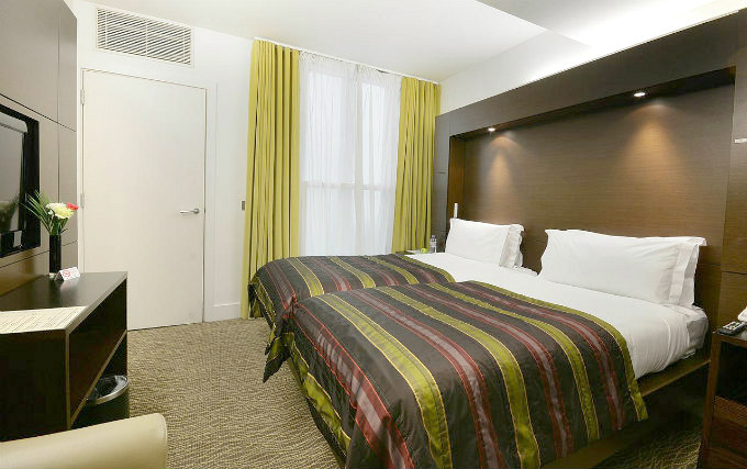 A twin room at The Park Grand London Paddington
