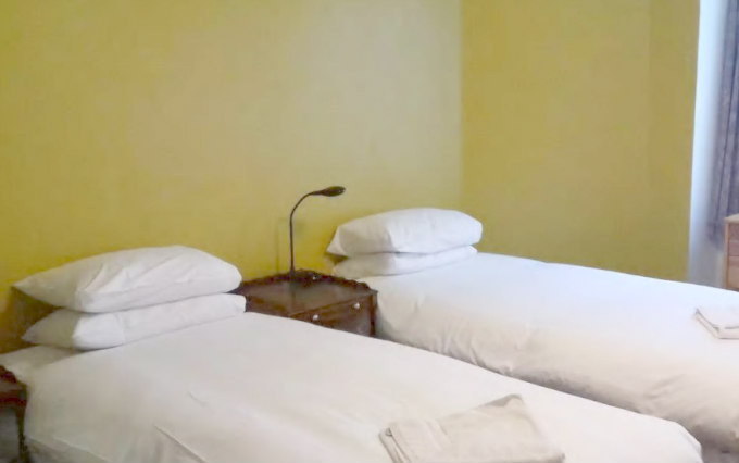 A comfortable twin room at Beersbridge Hotel
