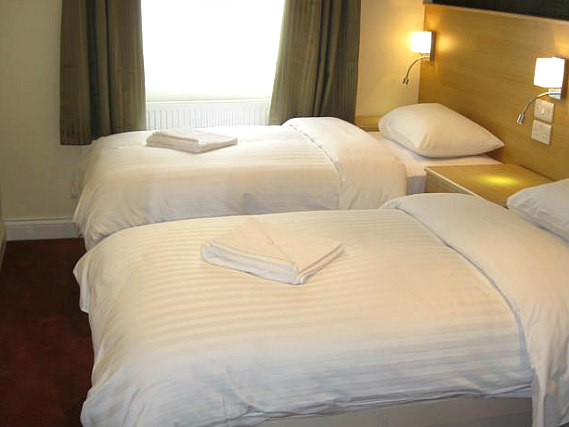 A twin room at Mina House Hotel London is perfect for two guests