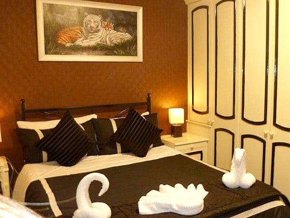 Rest easy in a comfortable bed in your room at Central Hotel London