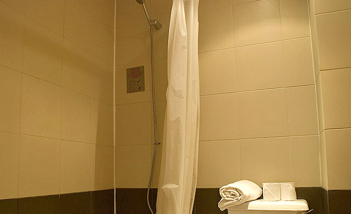 Relax in the private bathroom in your room