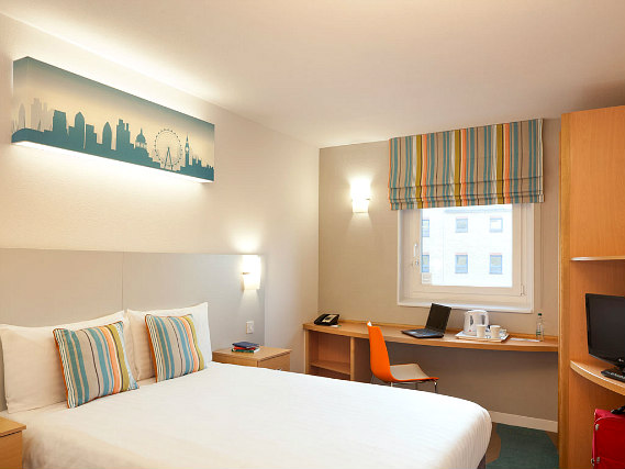 Get a good night's sleep in your comfortable room at Custom House Hotel