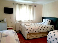 A typical quad room at Barking Park Hotel