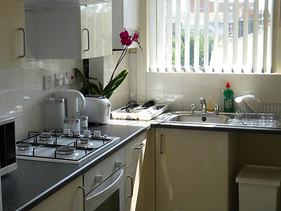 A clean and bright kitchen for you to prepare food