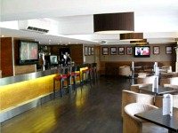 A stylish bar awaits downstairs