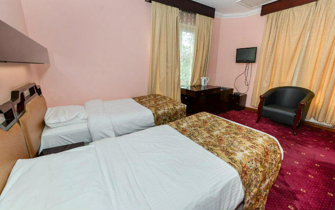 A comfortable twin room at Blue Star Hotel London